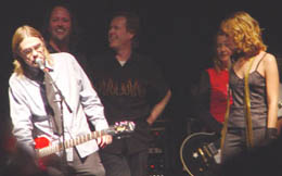 Moe accepts the guitar for the 2003 CASBY Lifetime Achievement Award.  (l.-r.): Moe, Brad, Dave, Kris, Renee.