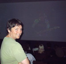 Jeff Rogers and his creation (squint real hard - can ya see Moe on screen back there?), Moe Berg: Song and Dance Man, at NXNE.  Photo by Cam Carpenter.