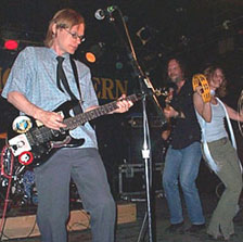 Moe gets his hair out of his face while Brad and Renee get down.