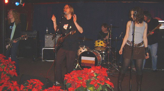 (l.-r.) Kris, Moe, Dave, Renee and Brad.  And some lovely poinsettias.  12/28.  Photo by Stephen A. Gazzola